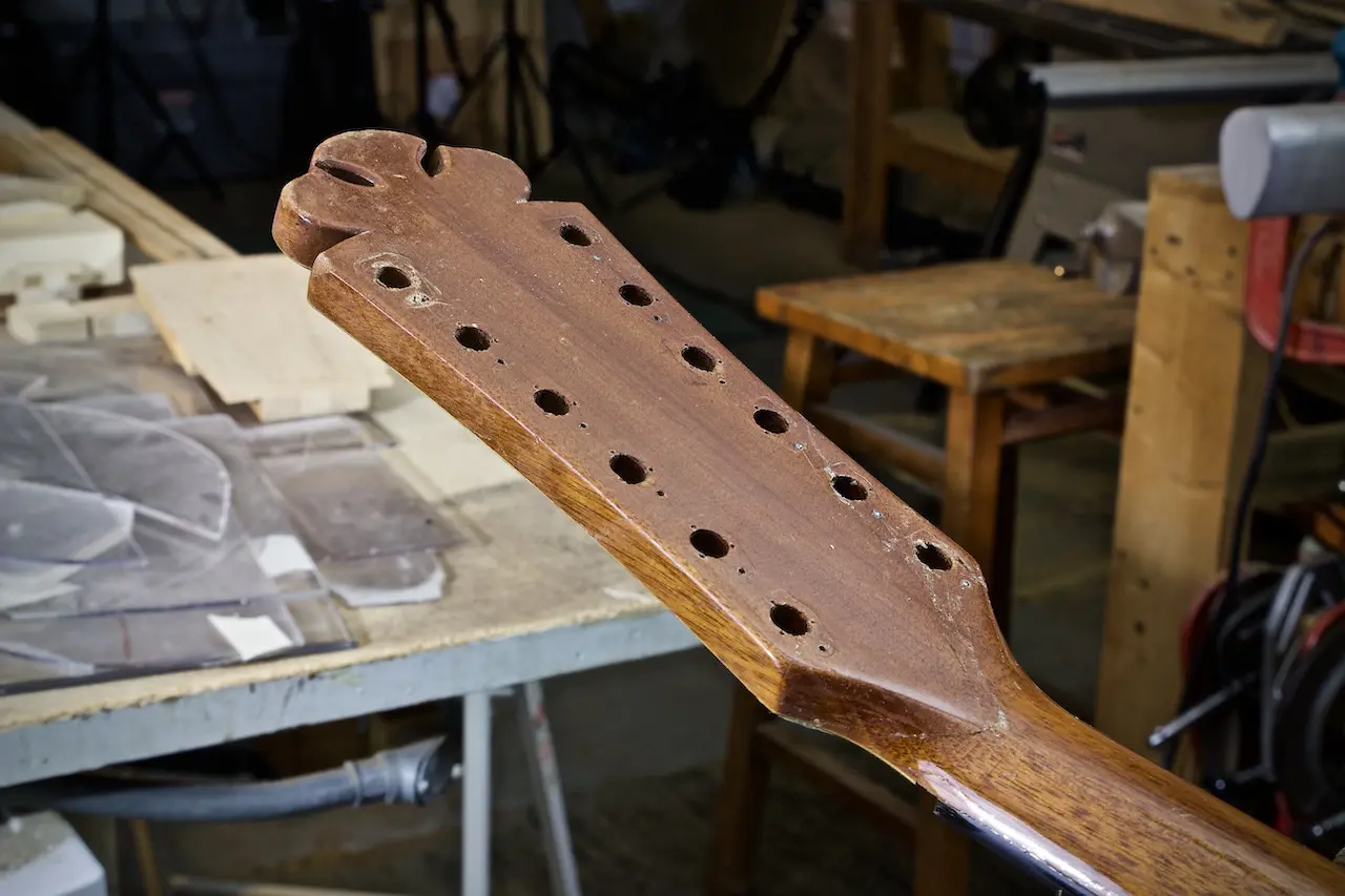 Headstock with holes